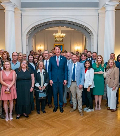 nhóm giáo viên với Thống đốc